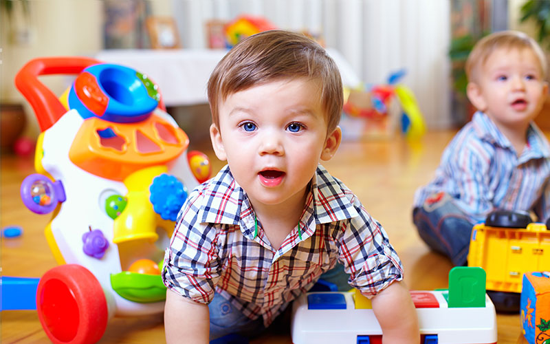 Toddler Playing in Child Care Center