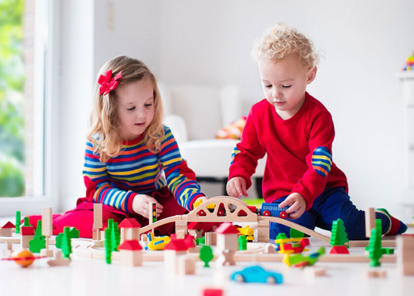 Toddlers Sharing Toys