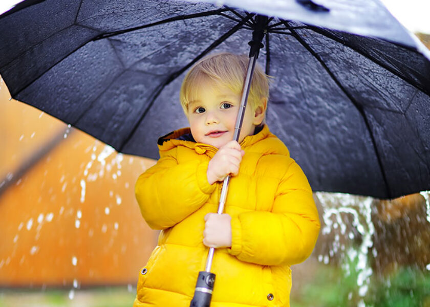 Preschool Student with Umbrella